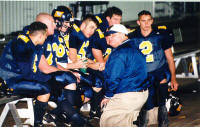 Coach Bonewald gives the offense a pep talk