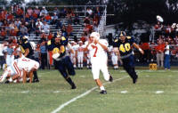 Greg Richter and Mark Gorzell chase quarterback