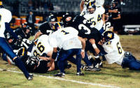 Bryan Serna and Pirates tackle Badger Jason Foley