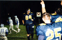 Pirates greet David Scheffler after his 48 yard interception run