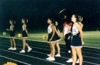 Cheerleaders watch the crowd