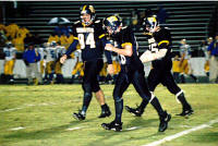 Greg Richter, Ryan Labus and Aaron Dzuik come off the field