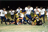 Adam Sekula tackles a tiger