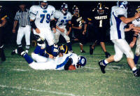 Adam Sekula tackles a Beaver