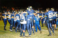 Daniel DeHoyos hugs Kuet Semlinger after the game