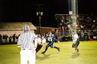 Ref reaches for flag before interception in the endzone