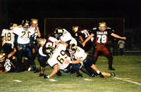 Chad Anderson,Damian Gomez and Sherman Posey gang tackle