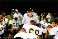 Coach Bonewald talks to Pirates after the victory