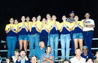 Pirette volleyball team cheers for the Pirates