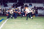 New Varsity Pirate Robert Celestino runs with the ball