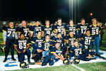 Seniors pose on the field after the game