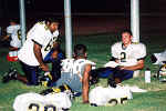 Randy Rodriguez and Jason Weed rest at halftime