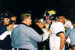 Coach Bonewald with Sherman Posey