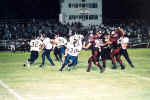 Braden Boening hands off to Bobby Joe Serna