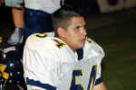 Derrick Dzuik rests on the sidelines