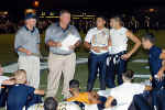 Coach Bonewald talks to his offense