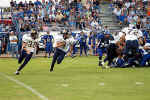 Braden Boening runs with the ball