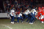 Derek Sefcik kneels down to start killing the clock at game's end