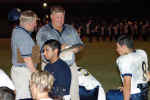 Coach Bonewald talks with coach and his quarterback