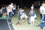 Chris Lyssy practices field goal snaps on the sidelines