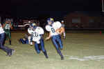 Johnny Hernandez looks to block for Braden Boening