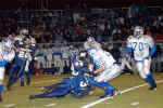 Garett Kolodziej and Frank Torres make tackle