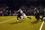 Bobby Joe Serna tackled on his way through the defense