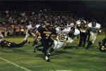 Bobby Joe Serna runs with the ball