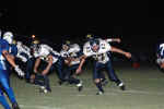 Jonathan Flores about to secure ball before making a long gain