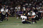 Wesley Malcher and Taylor Stringer tackle runner