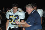 Coach Bonewald taks with Tim Pena