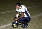 Jonathan Flores takes a well deserved break on the sidelines